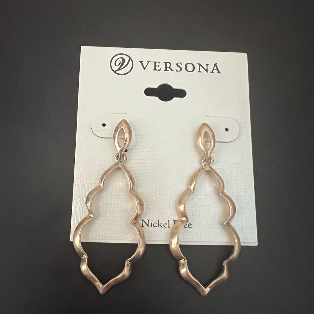 Women’s earrings from Versona. Gold colored